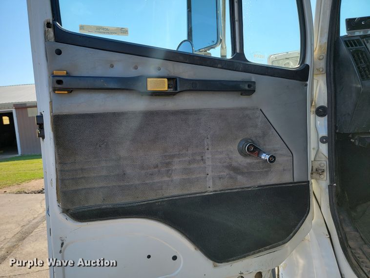 image for item JC9704 2001 Freightliner FL70  flatbed truck