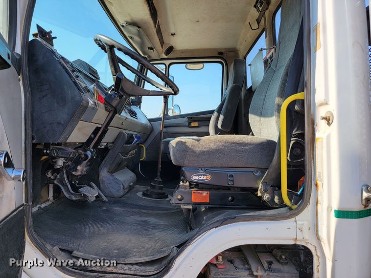 image for item JC9704 2001 Freightliner FL70  flatbed truck