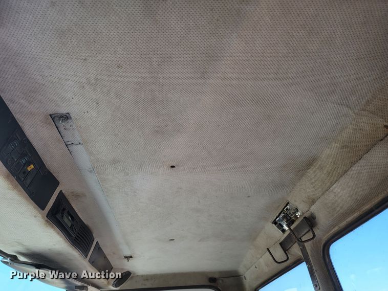 image for item JC9704 2001 Freightliner FL70  flatbed truck