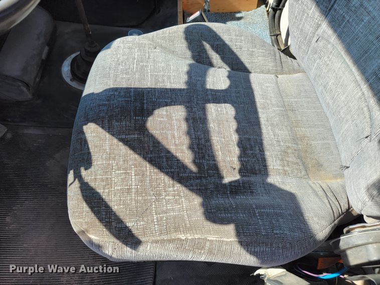 image for item JC9704 2001 Freightliner FL70  flatbed truck