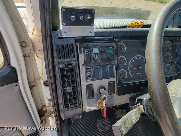 image for item JC9704 2001 Freightliner FL70  flatbed truck