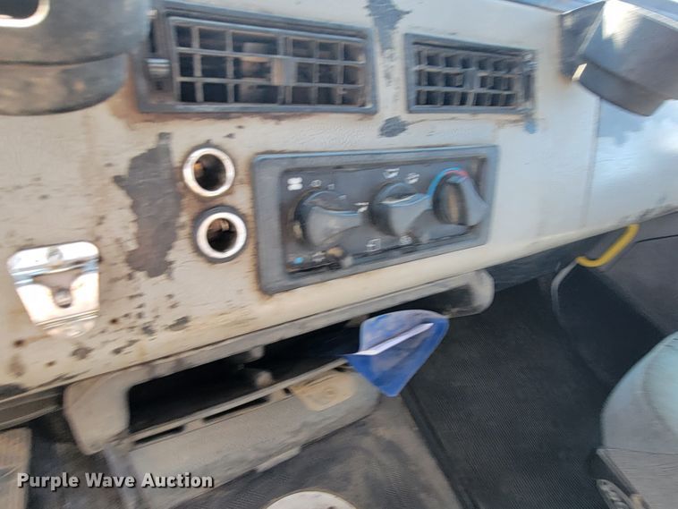 image for item JC9704 2001 Freightliner FL70  flatbed truck