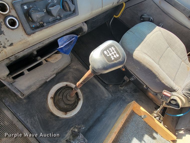 image for item JC9704 2001 Freightliner FL70  flatbed truck