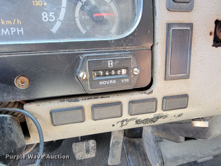 image for item JC9704 2001 Freightliner FL70  flatbed truck