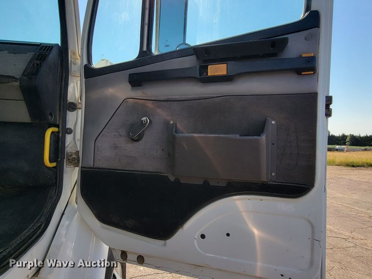 image for item JC9704 2001 Freightliner FL70  flatbed truck