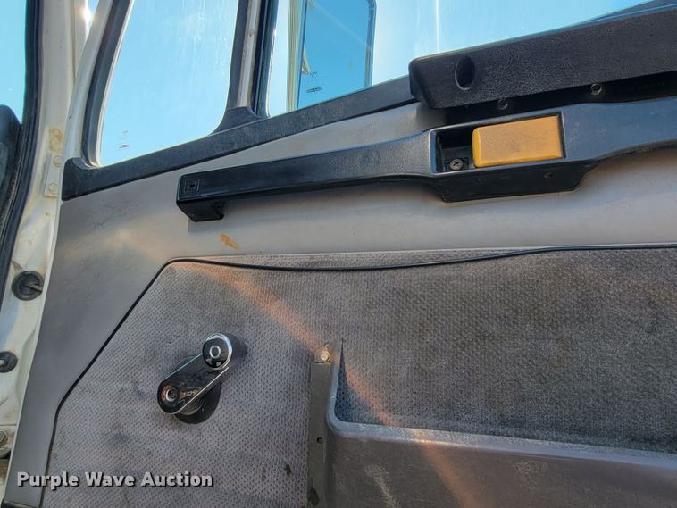 image for item JC9704 2001 Freightliner FL70  flatbed truck