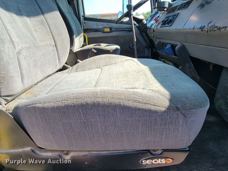 image for item JC9704 2001 Freightliner FL70  flatbed truck