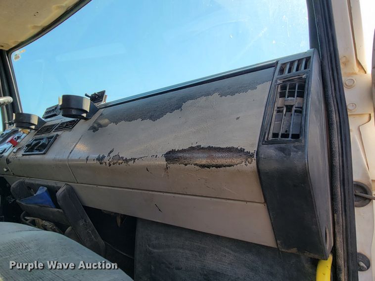 image for item JC9704 2001 Freightliner FL70  flatbed truck