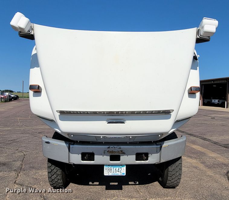 image for item JC9704 2001 Freightliner FL70  flatbed truck