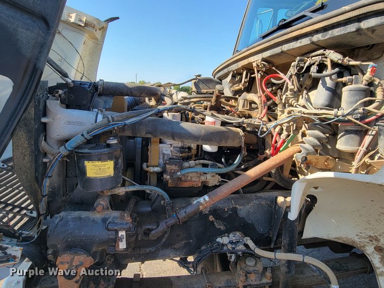 image for item JC9704 2001 Freightliner FL70  flatbed truck