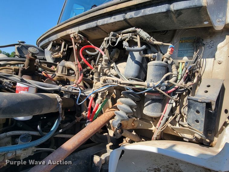 image for item JC9704 2001 Freightliner FL70  flatbed truck