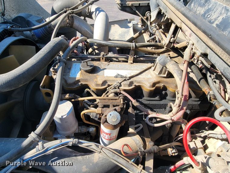 image for item JC9704 2001 Freightliner FL70  flatbed truck