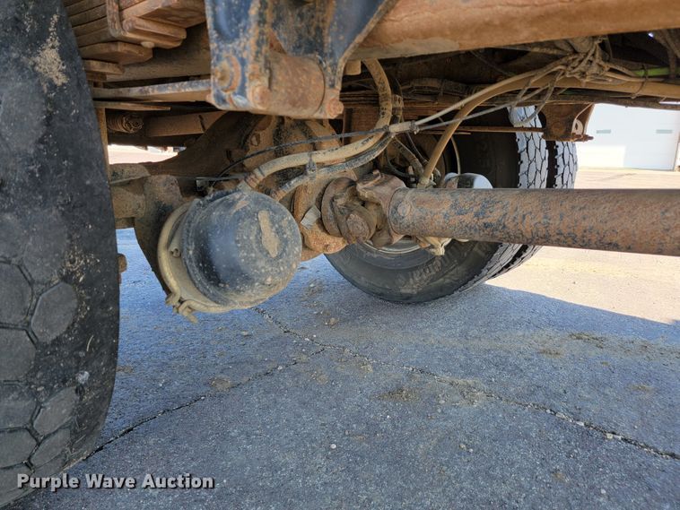 image for item JC9704 2001 Freightliner FL70  flatbed truck