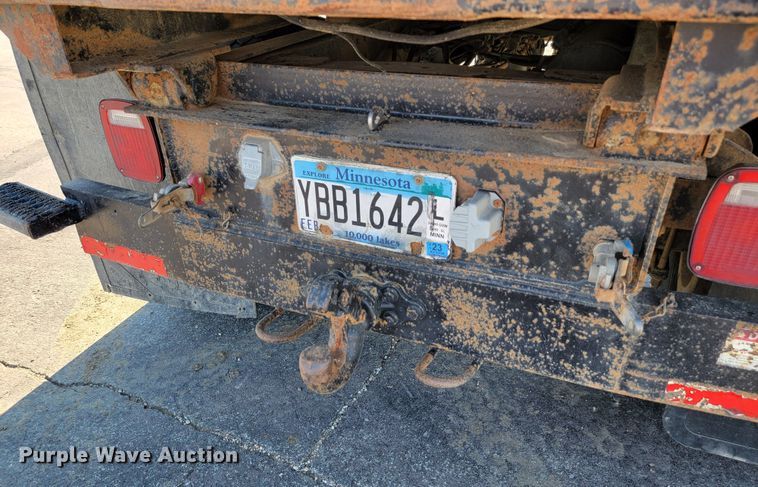 image for item JC9704 2001 Freightliner FL70  flatbed truck