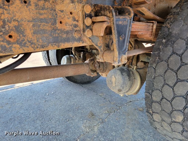 image for item JC9704 2001 Freightliner FL70  flatbed truck