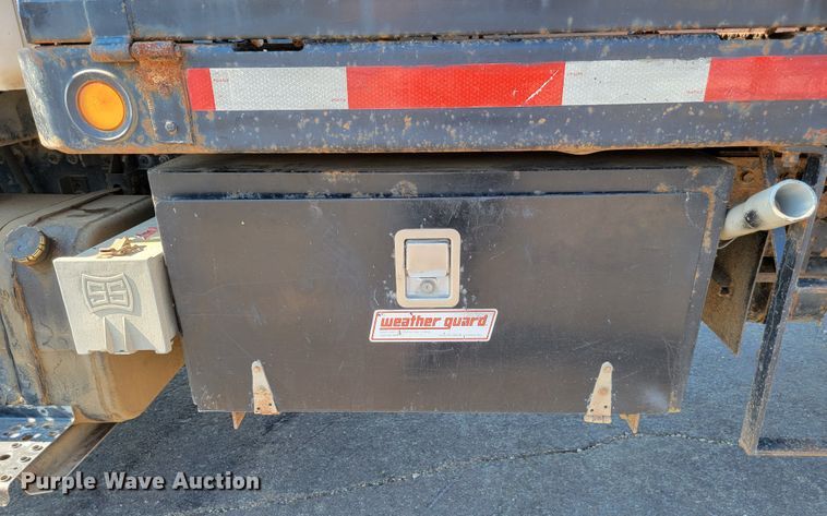 image for item JC9704 2001 Freightliner FL70  flatbed truck