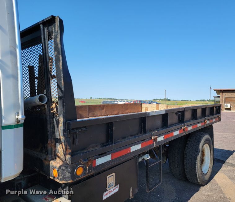 image for item JC9704 2001 Freightliner FL70  flatbed truck