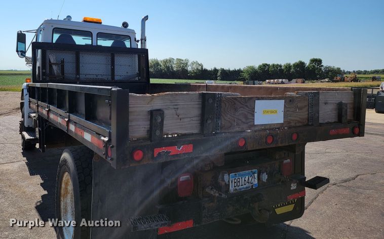 image for item JC9704 2001 Freightliner FL70  flatbed truck