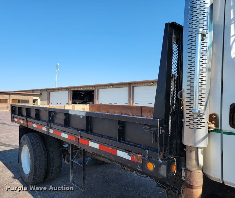 image for item JC9704 2001 Freightliner FL70  flatbed truck