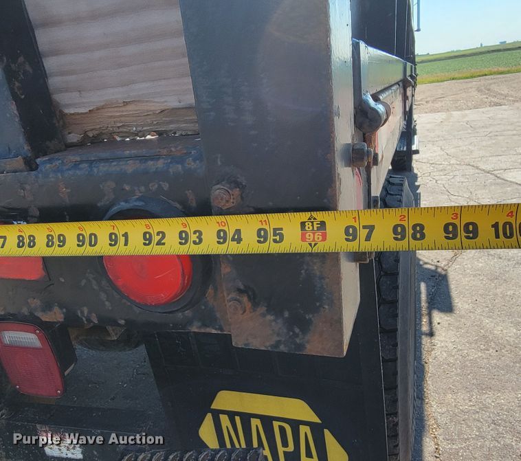 image for item JC9704 2001 Freightliner FL70  flatbed truck