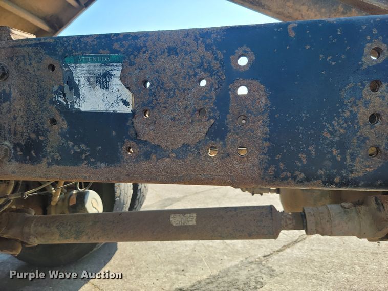 image for item JC9704 2001 Freightliner FL70  flatbed truck