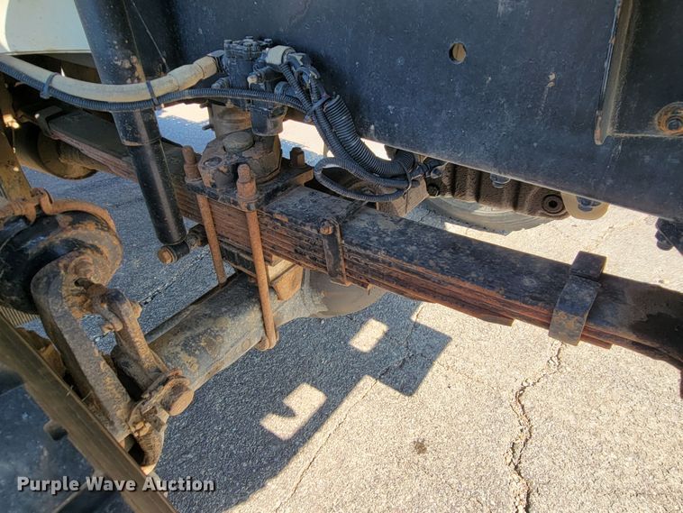 image for item JC9704 2001 Freightliner FL70  flatbed truck