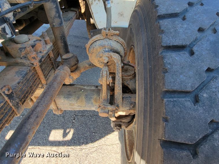 image for item JC9704 2001 Freightliner FL70  flatbed truck