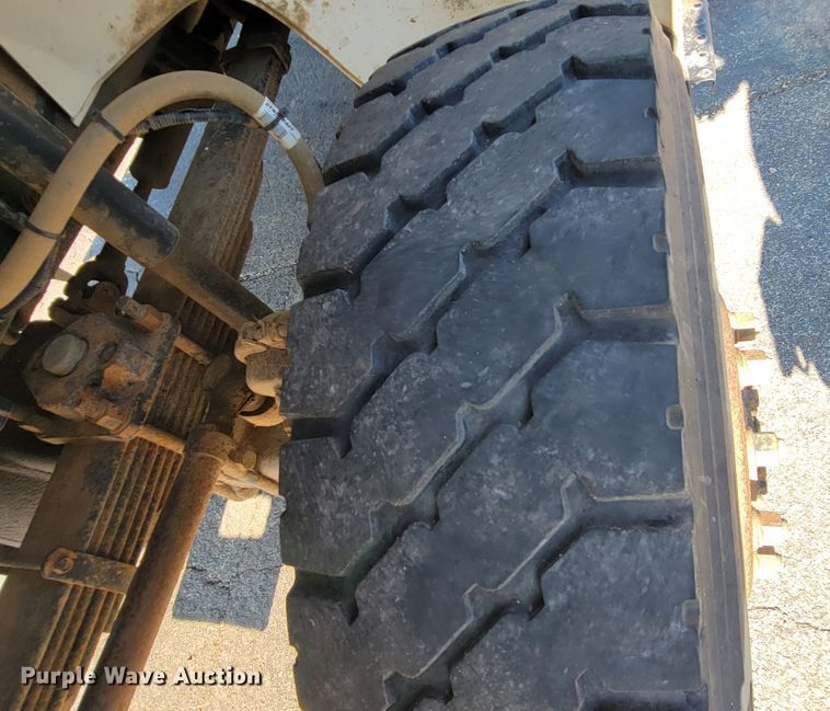 image for item JC9704 2001 Freightliner FL70  flatbed truck