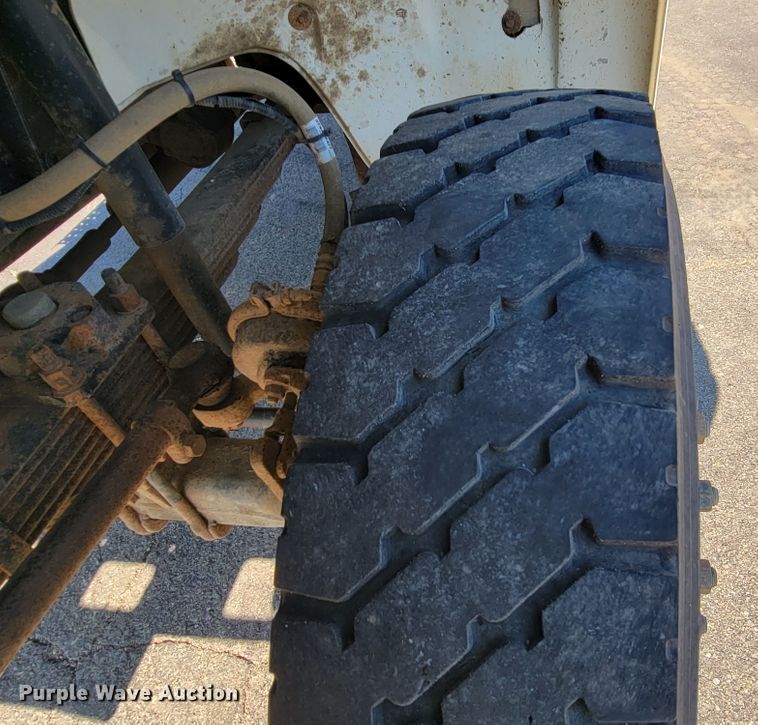 image for item JC9704 2001 Freightliner FL70  flatbed truck