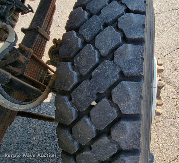 image for item JC9704 2001 Freightliner FL70  flatbed truck