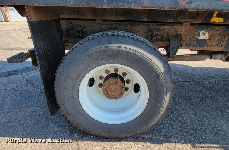 image for item JC9704 2001 Freightliner FL70  flatbed truck