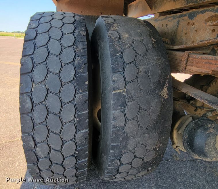 image for item JC9704 2001 Freightliner FL70  flatbed truck