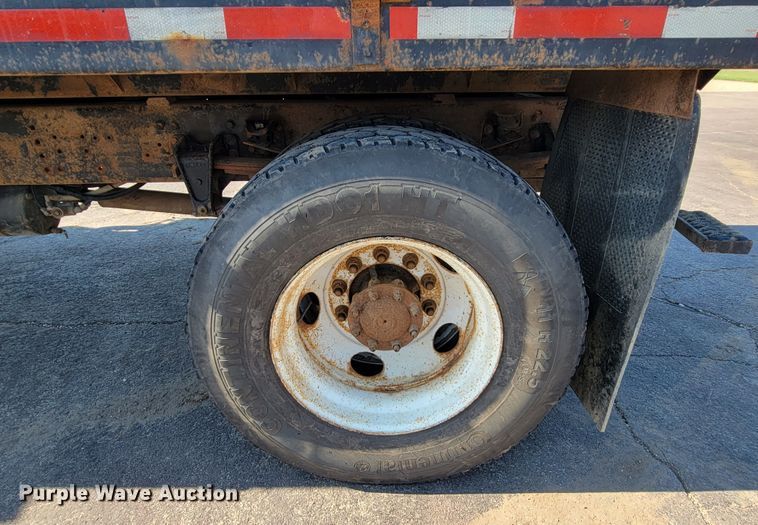 image for item JC9704 2001 Freightliner FL70  flatbed truck