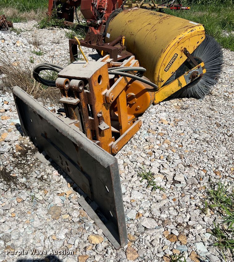 image for item JM9164 Burkeen  compact utility loader cable plow