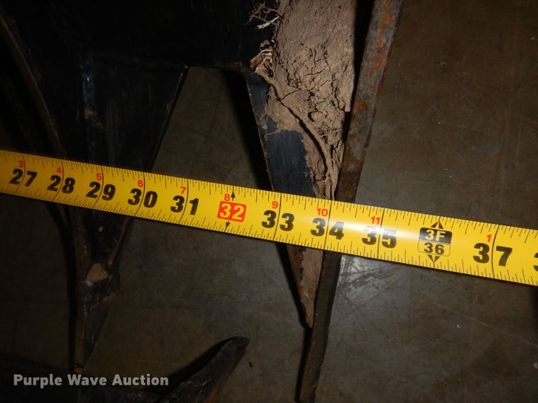 image for item MF9778 Titan  compact utility loader grapple bucket