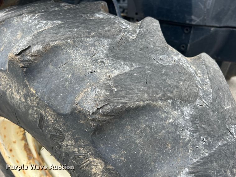 image for item JM9141 2005 New Holland TS115A  MFWD tractor