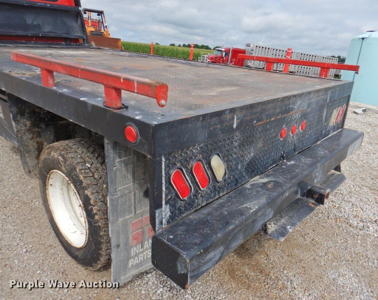 image for item DP4820 2003 International 4300  dump flatbed truck