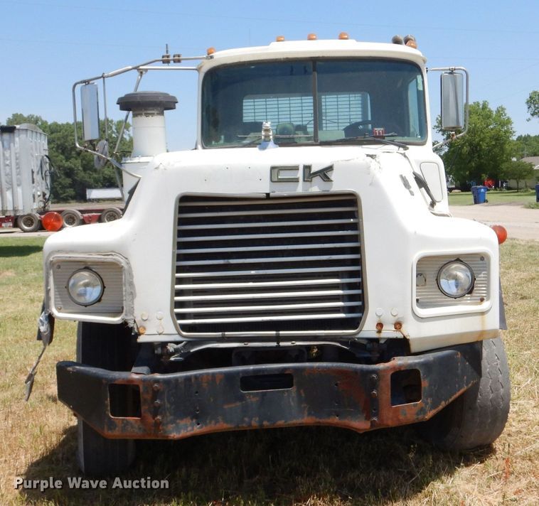 image for item LP9373 1999 Mack 600 DM Maxidyne  roll-off container truck