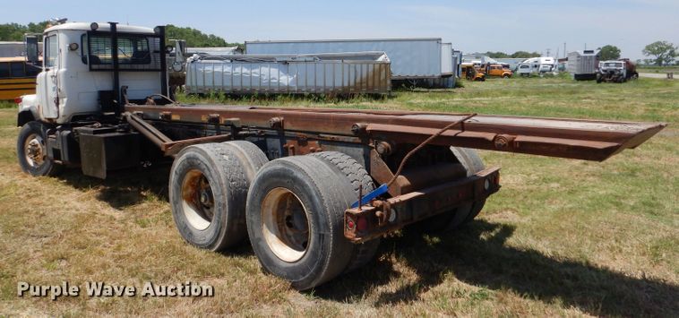 image for item LP9373 1999 Mack 600 DM Maxidyne  roll-off container truck