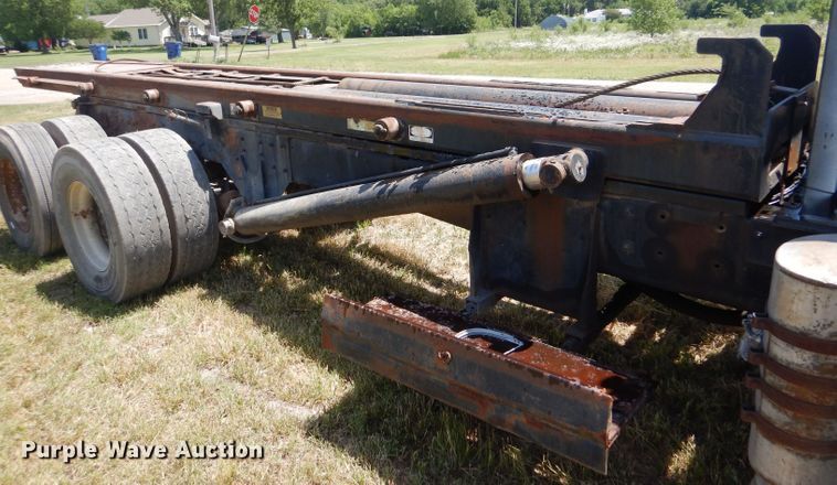 image for item LP9373 1999 Mack 600 DM Maxidyne  roll-off container truck