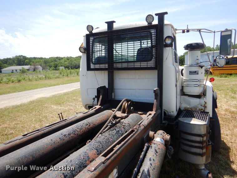 image for item LP9373 1999 Mack 600 DM Maxidyne  roll-off container truck