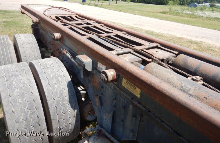 image for item LP9373 1999 Mack 600 DM Maxidyne  roll-off container truck