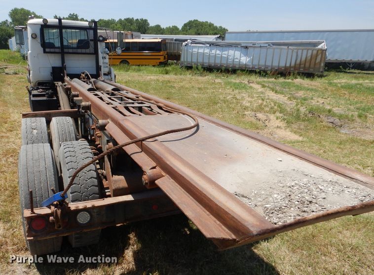 image for item LP9373 1999 Mack 600 DM Maxidyne  roll-off container truck