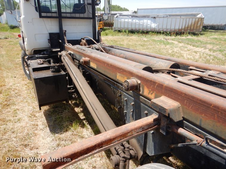 image for item LP9373 1999 Mack 600 DM Maxidyne  roll-off container truck