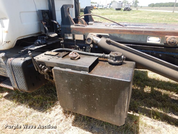 image for item LP9373 1999 Mack 600 DM Maxidyne  roll-off container truck