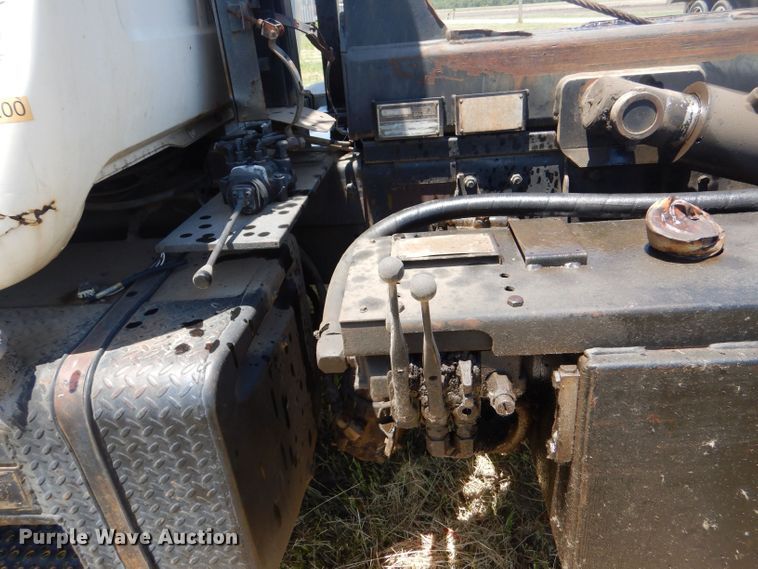 image for item LP9373 1999 Mack 600 DM Maxidyne  roll-off container truck