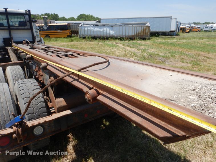 image for item LP9373 1999 Mack 600 DM Maxidyne  roll-off container truck