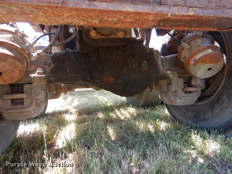 image for item LP9373 1999 Mack 600 DM Maxidyne  roll-off container truck