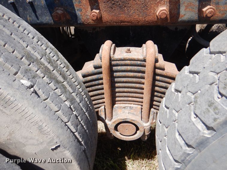 image for item LP9373 1999 Mack 600 DM Maxidyne  roll-off container truck