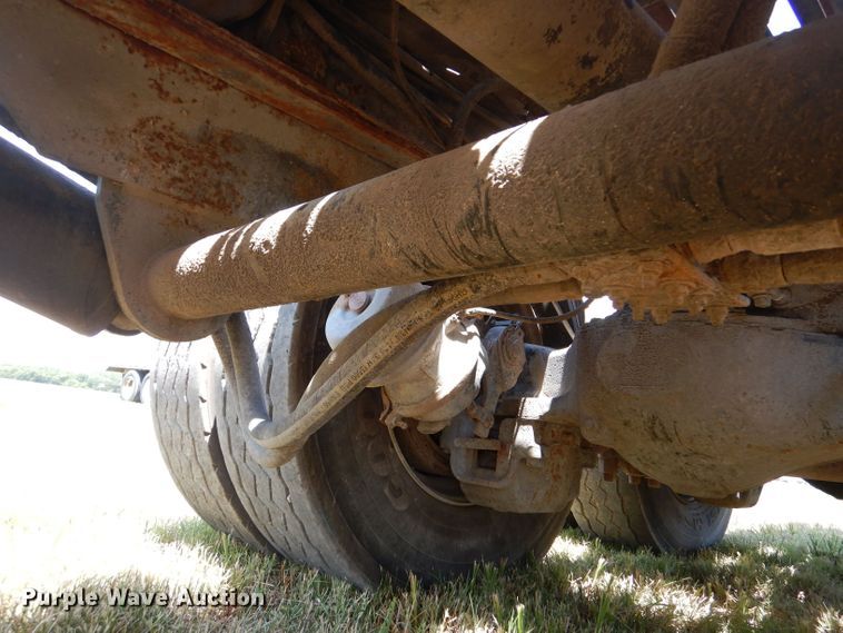 image for item LP9373 1999 Mack 600 DM Maxidyne  roll-off container truck